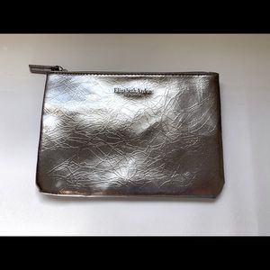 Elizabeth Arden silver pearl coloured cosmetic bag